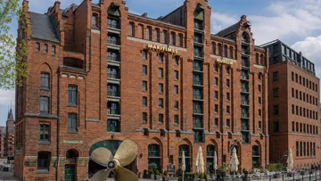 Large brick building with maritime museum sign.