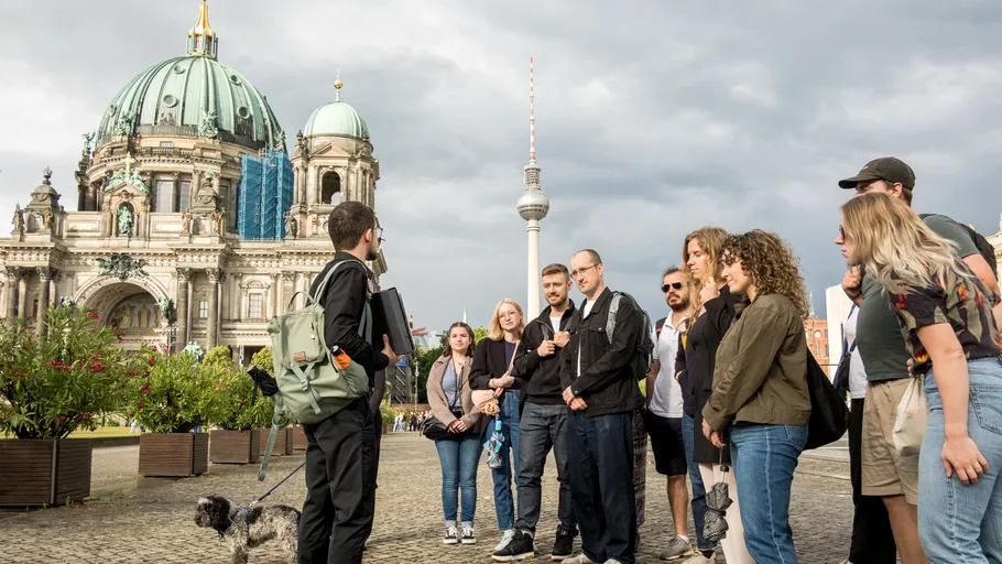 Tour group gathered near Berlin Cathedral.