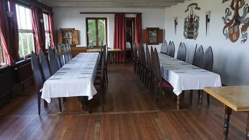 Long table set in elegant dining room.