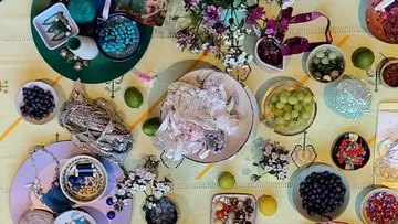 Assorted items on decorated tabletop.