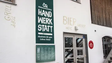 Building exterior with signage and entrance.
