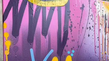 Colorful abstract painting with drips.