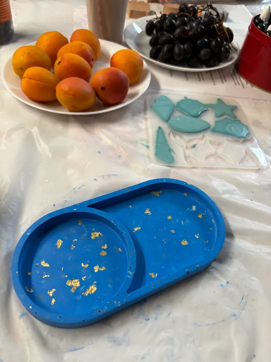 Fruits and mold on a table.