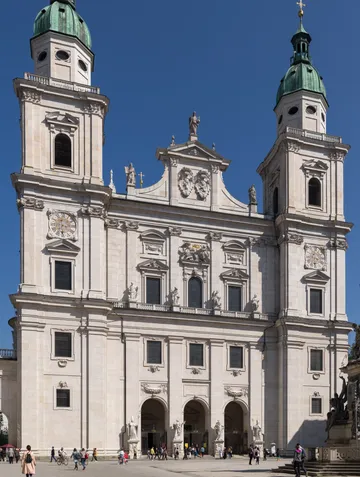 Cathedral facade with people nearby.