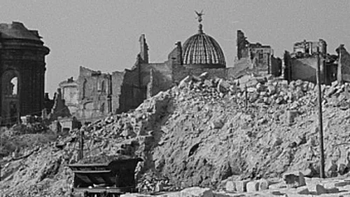 Ruins of a city with destroyed buildings.
