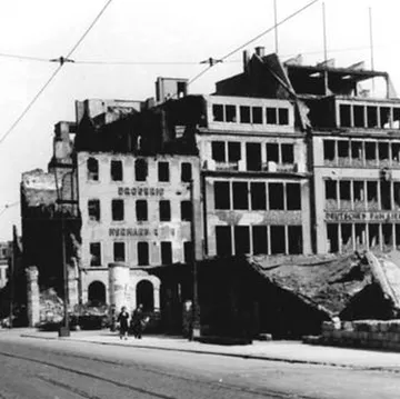 Ruined buildings standing on an empty street.