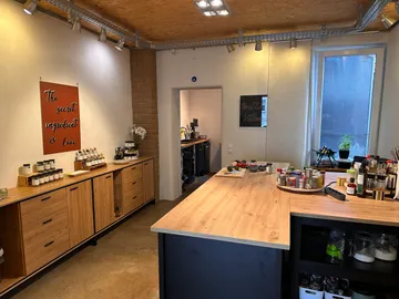 Wooden kitchen counter with spices, modern kitchen.