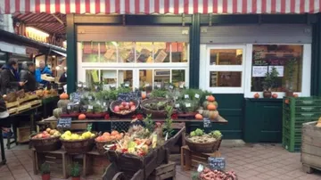 Fruit stand displaying colorful produce outdoors.
