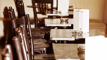 Empty tables and chairs in a café
