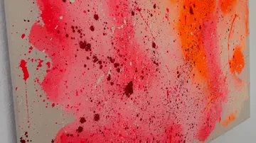Abstract painting: red, pink spray on canvas.