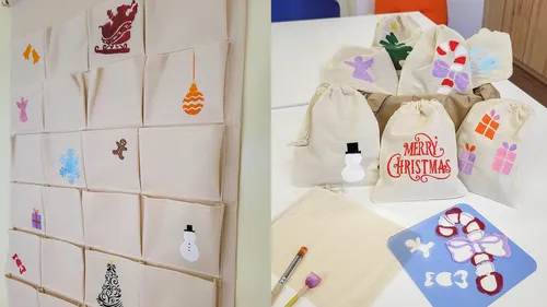 Advent calendar with holiday-themed bags on table.