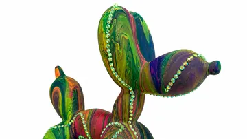Colorful balloon dog sculpture with rhinestones.