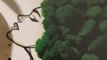 Stylized profile of woman with tree hair