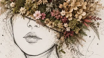Drawing of a face adorned with flowers.