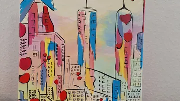 Abstract cityscape with colorful hearts.