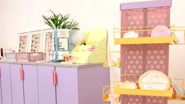 Colorful shelves with decorative items in room.