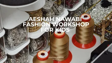 Spulen und Perlen in einem Modeworkshop.