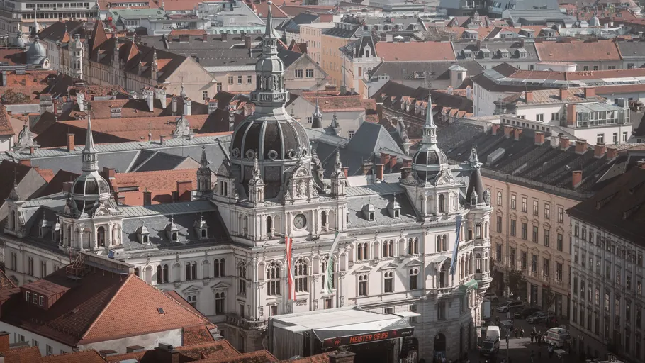 Ornate building in a busy urban setting.