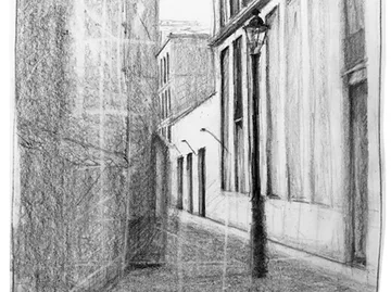 Narrow alley with street lights and buildings on both sides.