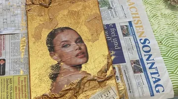 Collage of woman's face on golden background.