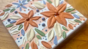 Textured floral painting on canvas.