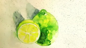 Lime and lemon painted in watercolor style.