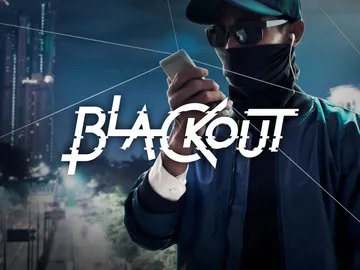 Man holds a cellphone, wears sunglasses and face masks at night.