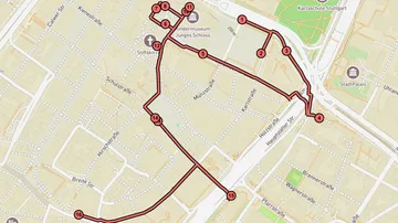 Karte zeigt Gehroute mit nummerierten Stopps.