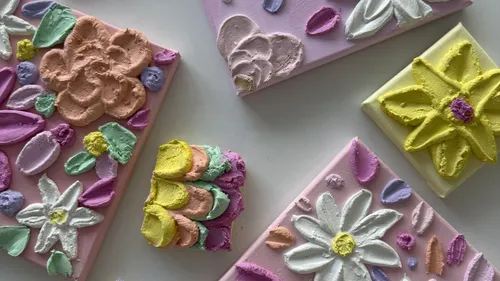 Textured floral paintings on canvas.