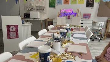Art studio with birthday decorations.