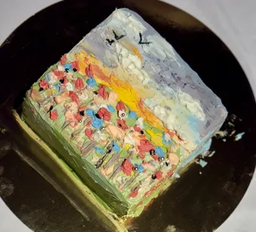Pastellkuchen mit Blumenlandschaft bemalt.