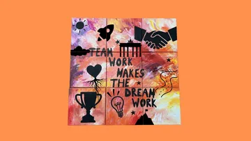 Hand-painted mural with teamwork message.