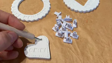 Hand tools clay heart decoration.
