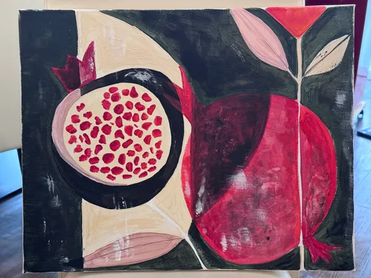 Abstract pomegranates painted on canvas.