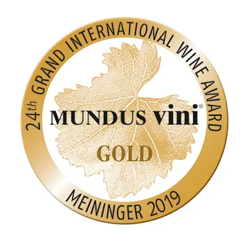 Gold medal with grape leaf design.