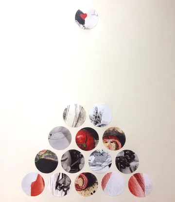 Circles arranged, a red heart on top.