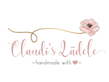 Verzierte Schrift mit einem floralen Element und Herzsymbol.