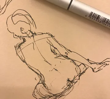 A sketch of a seated body on paper.