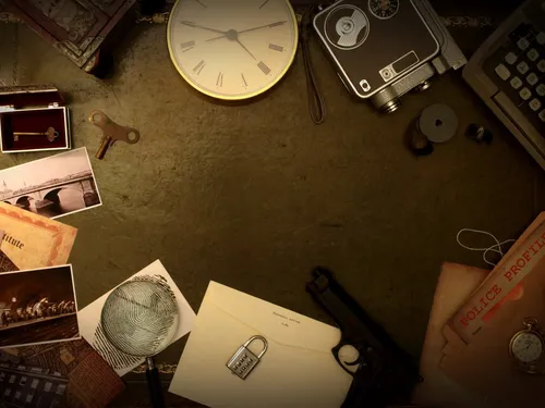 Table with old objects, photos and a clock.