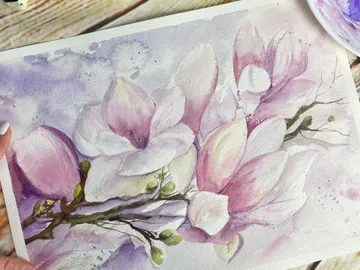 Wasserfarbenbild von Magnolienblüten auf Papier.