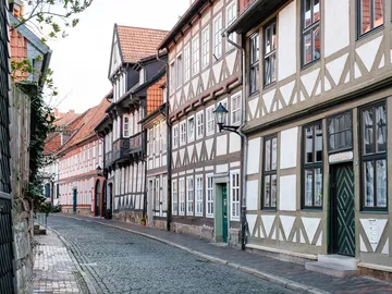 Narrowest street, historic half-timbered houses, quiet atmosphere.