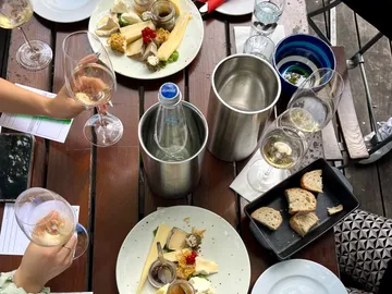 Included with every tasting: cheese, mineral water, bread and oil