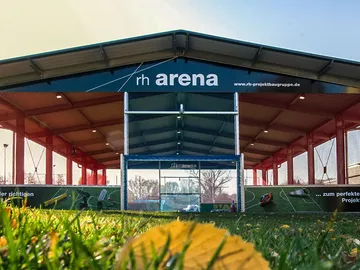 Sports arena with net, ready for outdoor activities.