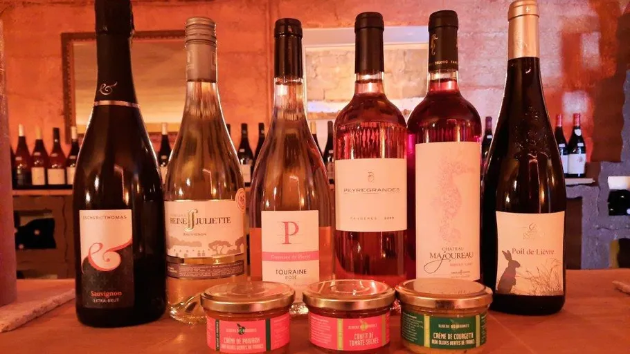 Assortment of six wine bottles and three jars.