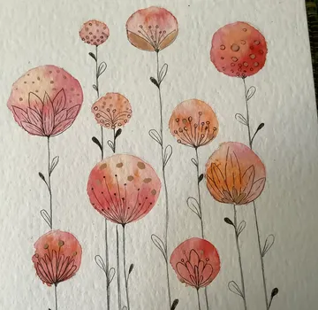 Colorful flowers grow on a textured background.