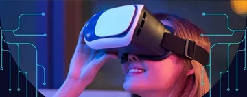 A person is wearing VR glasses and is smiling.