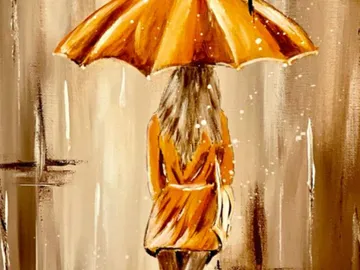 Woman with yellow umbrella standing in front of a grey background.
