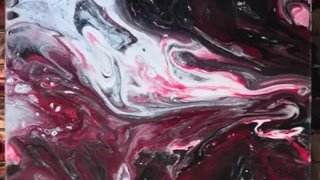 Abstract painting with swirling red and black colors.