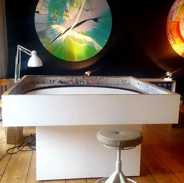 A table is ready to create creative art.