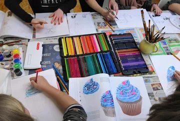 Colourful pencils are used to draw candy